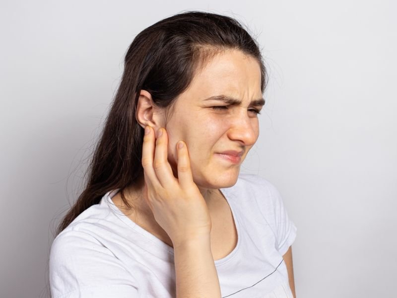 o que é dor de cabeça ATM